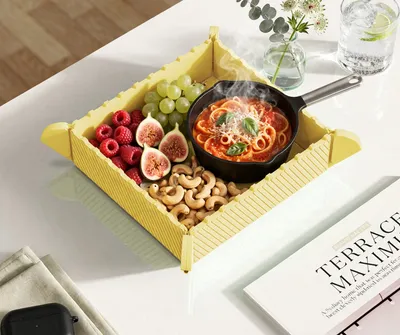 🍲【Värmeisolerande silikonunderlägg med magnetfäste】🧲—— När du breder ut det fungerar det som ett värmeisolerande underlägg, när du viker ihop det blir det en skål, och när du fäster det på kylskåpet tar det ingen plats! ✨