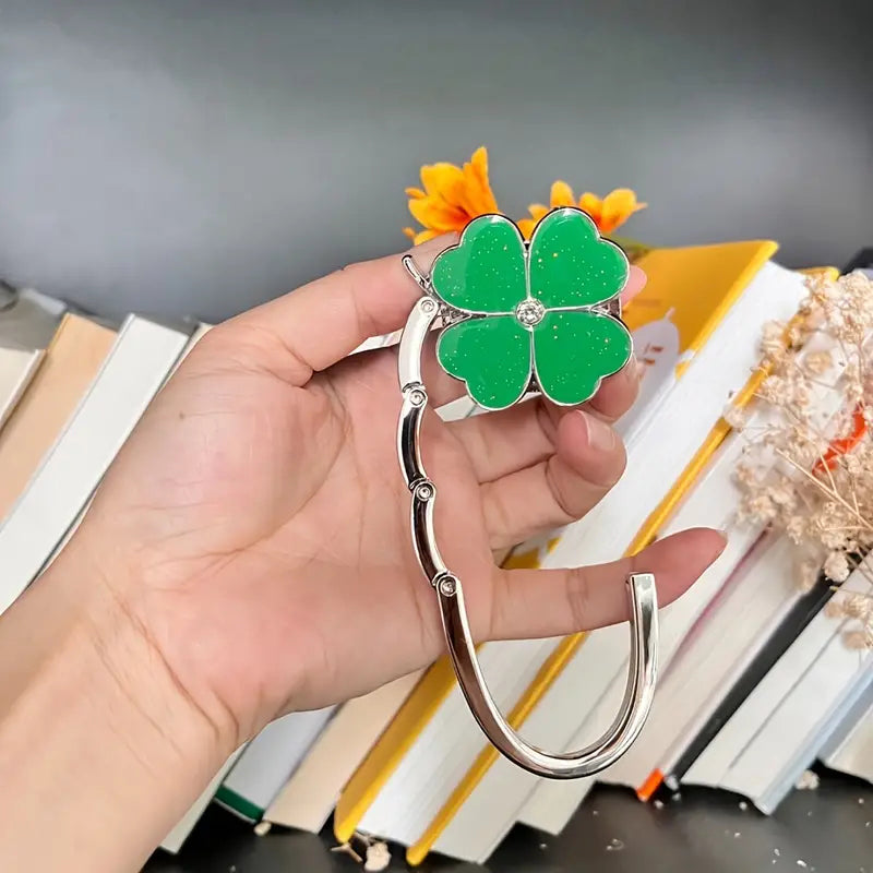 🍀Handtaschenhaken in Form eines vierblättrigen Kleeblatts ✨• Faltbar & rutschfest